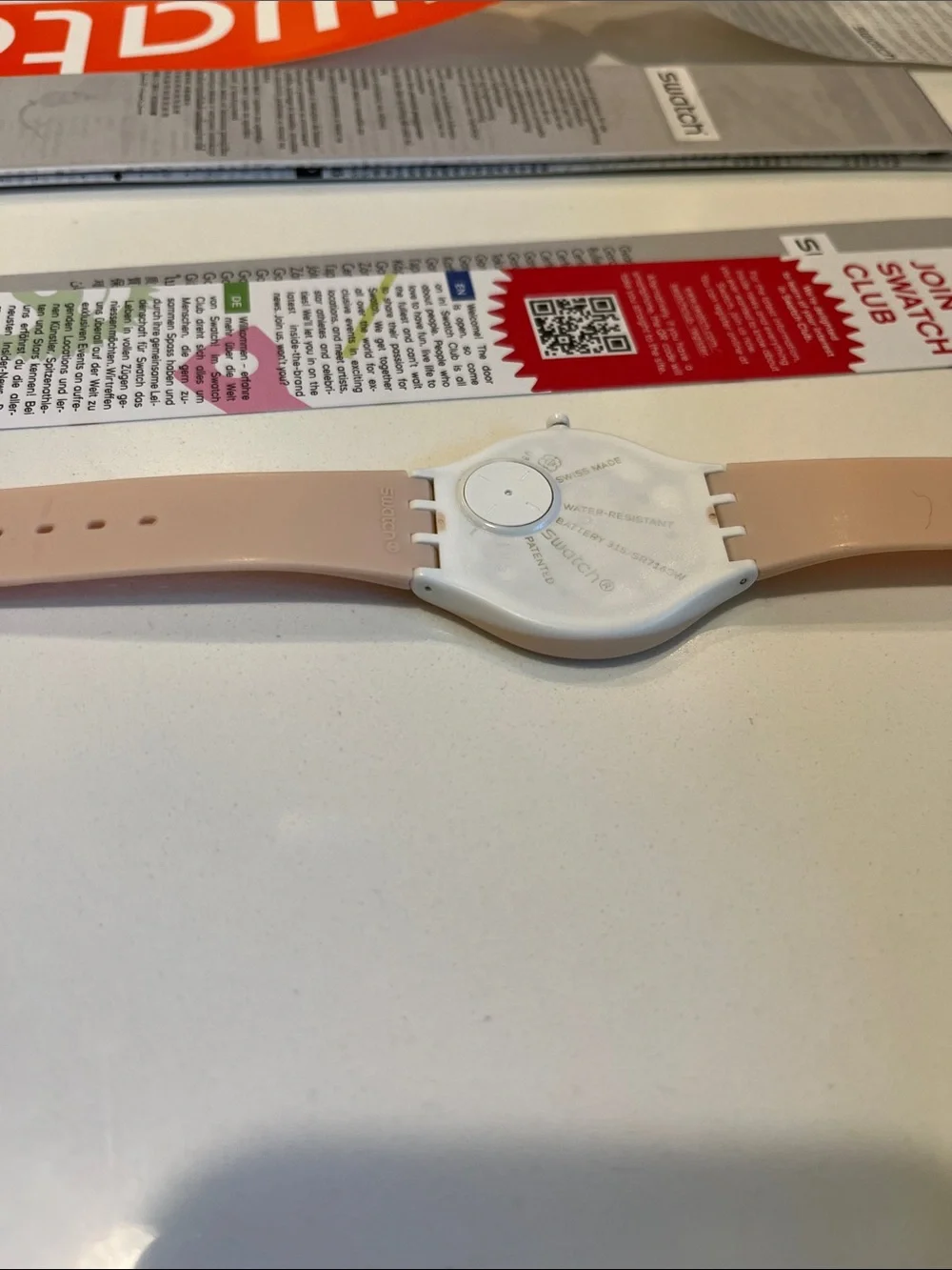 Swatch SKINSKIN watch (model SVUT100) ultra-thin pale pink strap w/gold accents